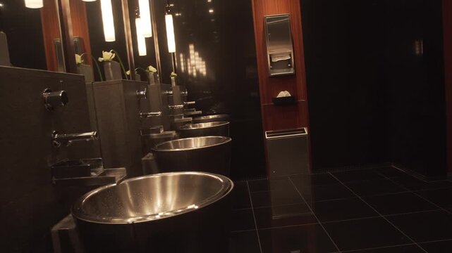 A nice looking bathroom at a hotel.