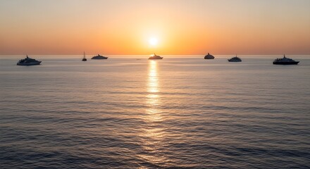 Obraz premium Serene Ocean Voyage A Fleet of Ships Silhouetted Against a Fiery Sunset