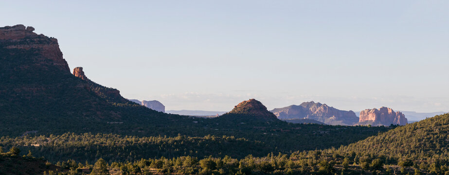 Panoramic view of rugged wooded landscape and rock formations