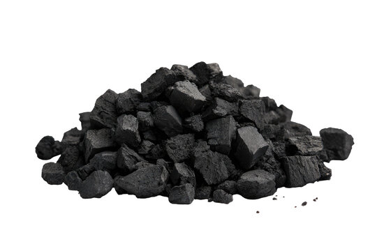 A pile of dark gray charcoal pieces, isolated on a black background, textured and irregular