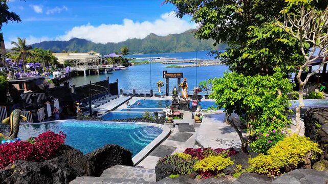 Natural geothermal hot spring pools overlooking Lake Batur and volcanic landscape in Kintamani Bali Indonesia #01