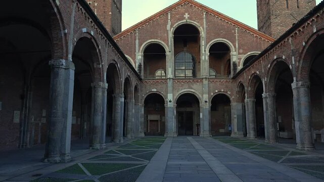 Panning view of the Basilica of Saint Ambrogio. It is recalls the paleochristian and medieval periods. It stands in Piazza Saint Ambrogio, in the heart of the city of Milan.Italy