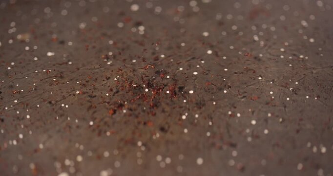 red-hot used oil , frying pan with hot sunflower oil with bubbles and part of the fried food in the pan after cooking