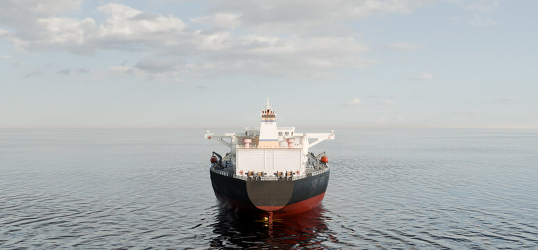 Oil tanker from behind on calm sea, global shipping and energy industry concept