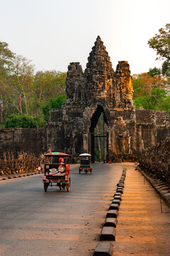 South Gate of ancient temple complex with traffic passing through