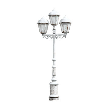 A weathered white outdoor lamp with three ornate light heads, on a black background
