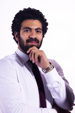 Confident professional man portrait in white shirt and tie smiling with thoughtful pose for business profile