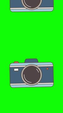 camera and photo frames icon on green background