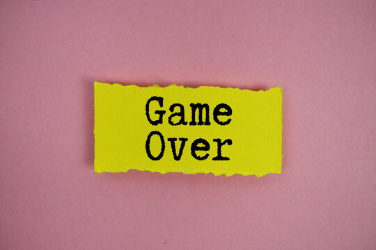 Game Over text written on paper rip