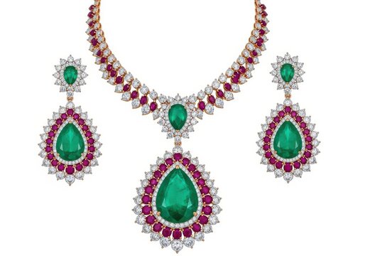 Elegant emerald and ruby jewelry set with intricate diamond detailing