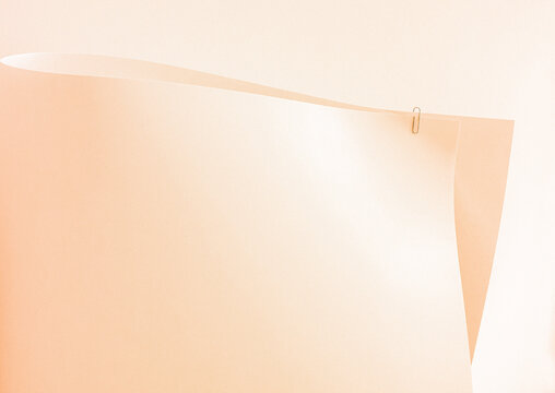 A1 sheet of paper in warm tones.