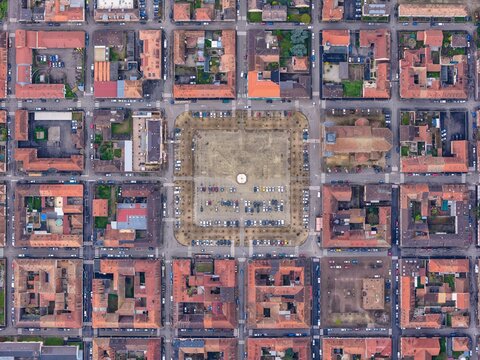 Aerial view of the meticulously planned city layout, revealing a central square surrounded by buildings with terracotta roofs, Neuf-Brisach, Grand Est, France.