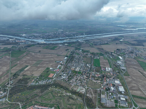 Aerial view of a star-shaped fortress standing firm amidst the landscape, with its aged bricks whispering tales of battles long past, Neuf-Brisach, Grand Est, France.