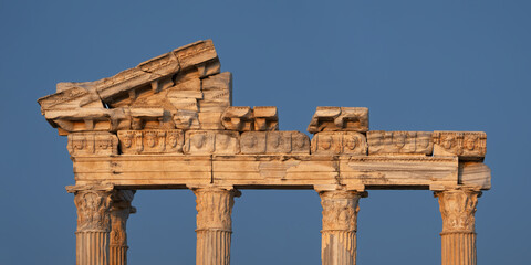 Fototapeta premium Ruins of the Temple of Apollo in Side, upper part of the columns and the portico. Antalya, Turkey.