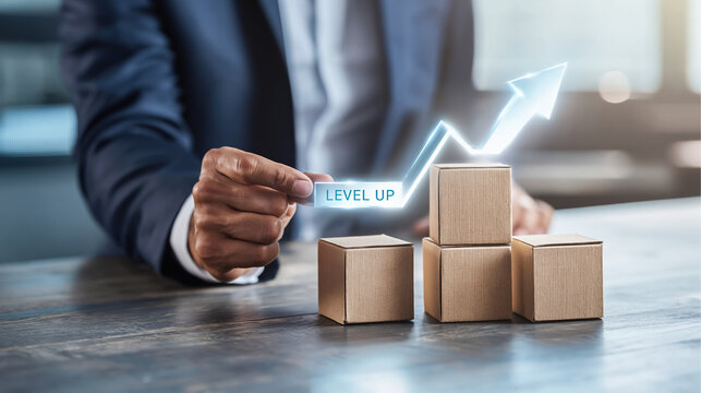 Business achievement level up arrow over stacked cardboard box showing growth and progress