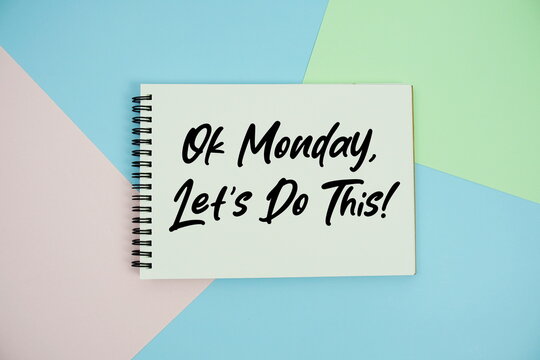 Ok Monday, Let's Do This! text written on notepad flat lay on multicolor pastel background