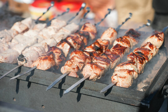 Shish kebab. ork meat threaded onto skewers and grilled.