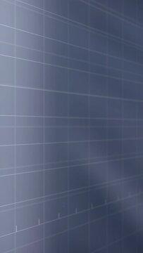Vertical video: Blue grid curtain moving from left, revealing desk with blue helmet for design