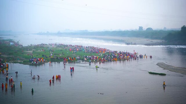 Chhath Puja at Kalindi Kunj, New Delhi, where devotees come together along the Yamuna River to offer prayers to the Sun God during sunrise and sunset