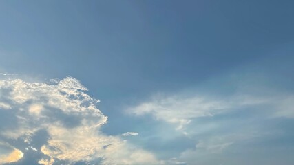 Fototapeta premium Blue Sky with Clouds Background Late Afternoon Light Subtle Rainbow Effect Copy Space