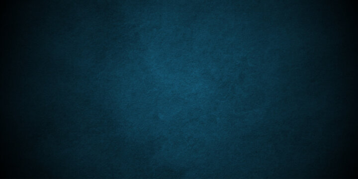 Dark blue parchment studio background. Grunge backdrop texture, watercolor painted wall concrete blue concrete stone rough. watercolor textures black paper background.