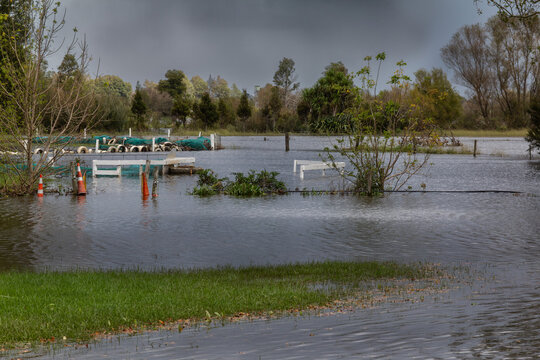 Flooded go-kart track and public park at Te Aroha, New Zealand. Flooding adjacent to Waihou River after Cyclone Vaianu, April 2026. Matamata-Piako District, Waikato region.