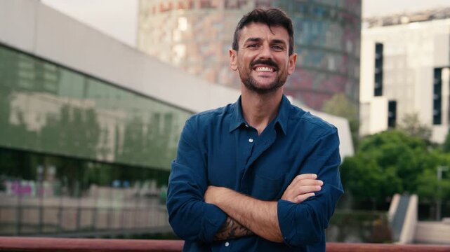 Video of modern man posing and looking at camera in the city