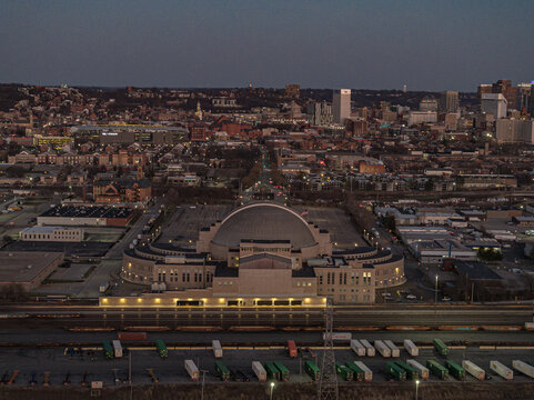 Aerial view of the iconic Music Hall and Cincinnati Union Terminal, a symphony of lights against the twilight canvas, Cincinnati, Ohio, United States.