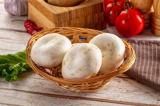 Raw white champignon mush heap