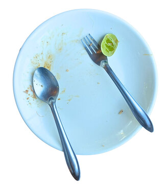 Empty plate fork spoon lime leftover food top view minimal