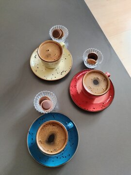 Turkish coffee prepared in colorful cups