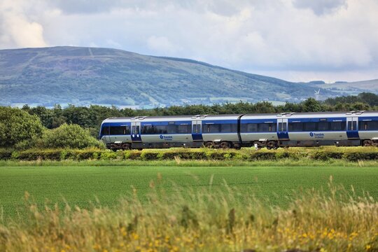 LONDONDERRY, UK - JUNE 24, 2024: Translink Northern Ireland Railways passenger train in county Londonderry in Northern Ireland, UK.