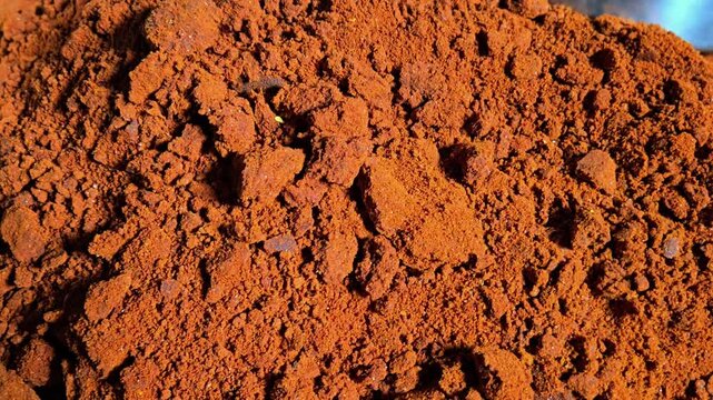 A vibrant, freshly homemade red chili powder with a coarse texture. This complex blend features 28 spices, highlighted by the distinct flavors of Reshampatti and byadgi Mirch chilies.