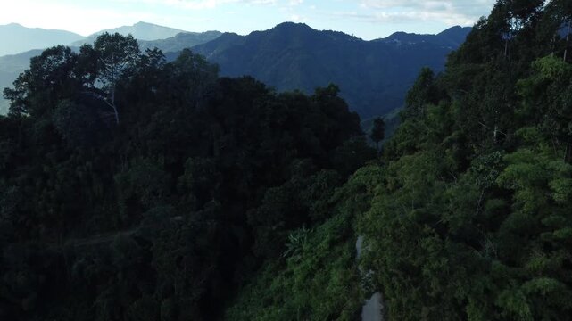 The light of the sunset has created parallel lines on the hills.