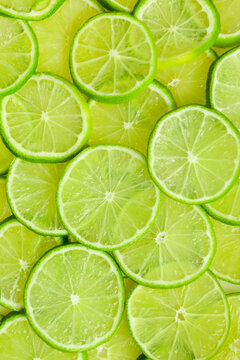 Lime pattern. Top view citrus green fruit. Close up.