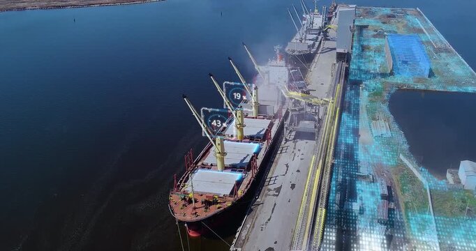 Concept of sea cargo transportation. Grain loading in hold of bulk carrier ship with elevator crane. Port grain elevator. Industrial sea trading port bulk cargo zone grain terminal. Smart logistic