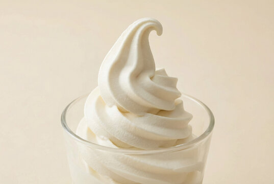 Close Up Vanilla Soft Serve Ice Cream Texture in Glass Cup