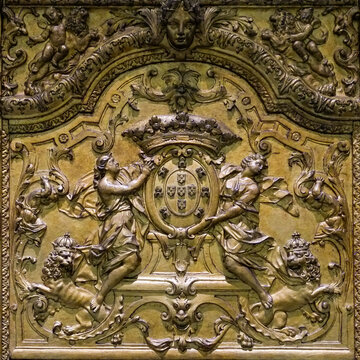 Bronze crest relief panel with classical figures