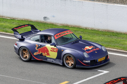 Stavelot, Belgium - April 5th 2026 : View on a matte blue Porsche 993 Rauh-Welt Begriff driving on a street.