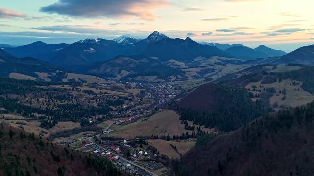 Aerial Hyperlapse of Mountain Village and Mala Fatra Peaks at Twilight