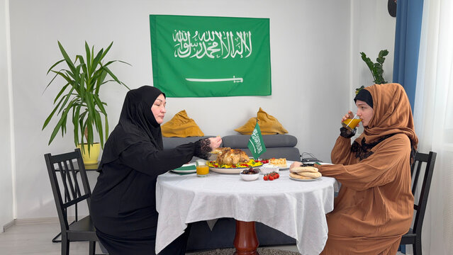 Saudi Arabia women sharing Kabsa meal during Ramadan
