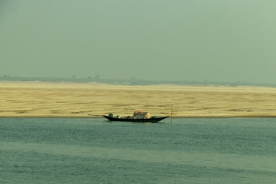 This landscape alluvial soil and the calm on waters with wooden boat