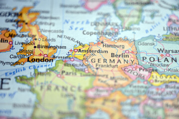 Obraz premium Amsterdam Highlighted on World Map with Soft Blur Defocused Background Modern Travel Concept