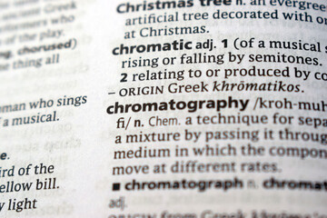Fototapeta premium English Dictionary Page Close Up With The Word Transcription Of -chromatic