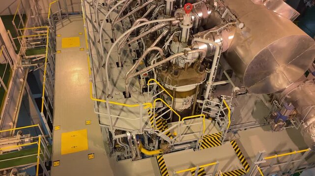 Industrial atmosphere inside engine room of modern ship