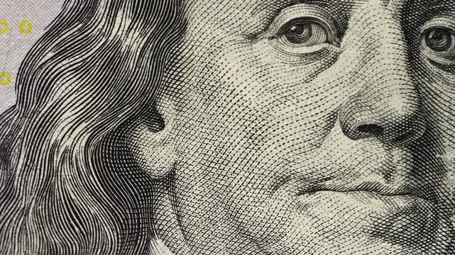 Macro perspective American 100 dollar bill highlighting Federal Reserve System. Financial literacy, banking, currency authenticity background. Economic prosperity, investment success, monetary concept