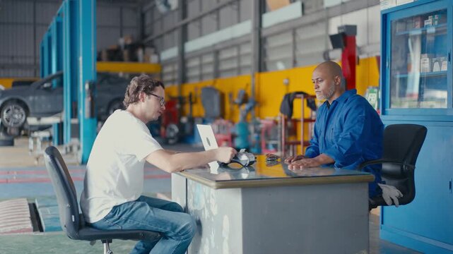 Auto repair consultation between mechanic and customer workshop vehicle inspection service discussion, mechanic consultation garage workshop with car repair service, car repair workshop service