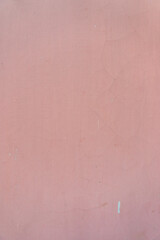 Fototapeta premium Wall texture is pink or light purple. The wall looks a little stained.