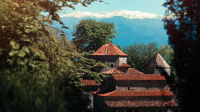 Georgian traditional church in Kakheti on the mountain background