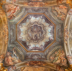 Fototapeta premium VERCELLI, ITALY - JANUARY 16, 2026: The baroque fresco in the cupola and ceiling Glory of St. Cristophorus in the church Chiesa di San Cristoforo by Francesco Maria Bianchi from 18. cent.